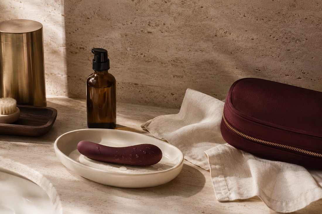 Luxury intimate wellness product care essentials on a travertine vanity